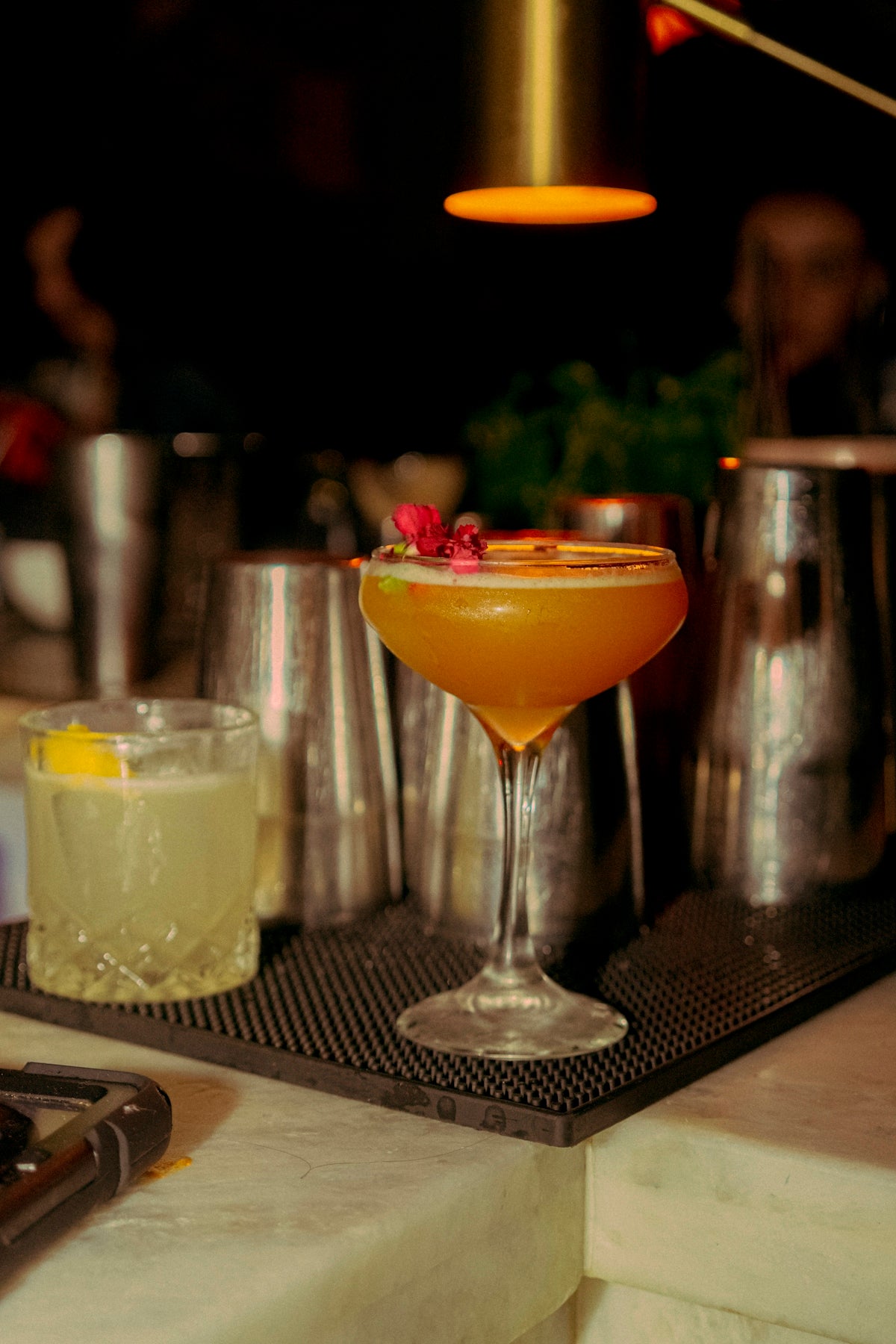 Cocktails are ready to serve at the bar.