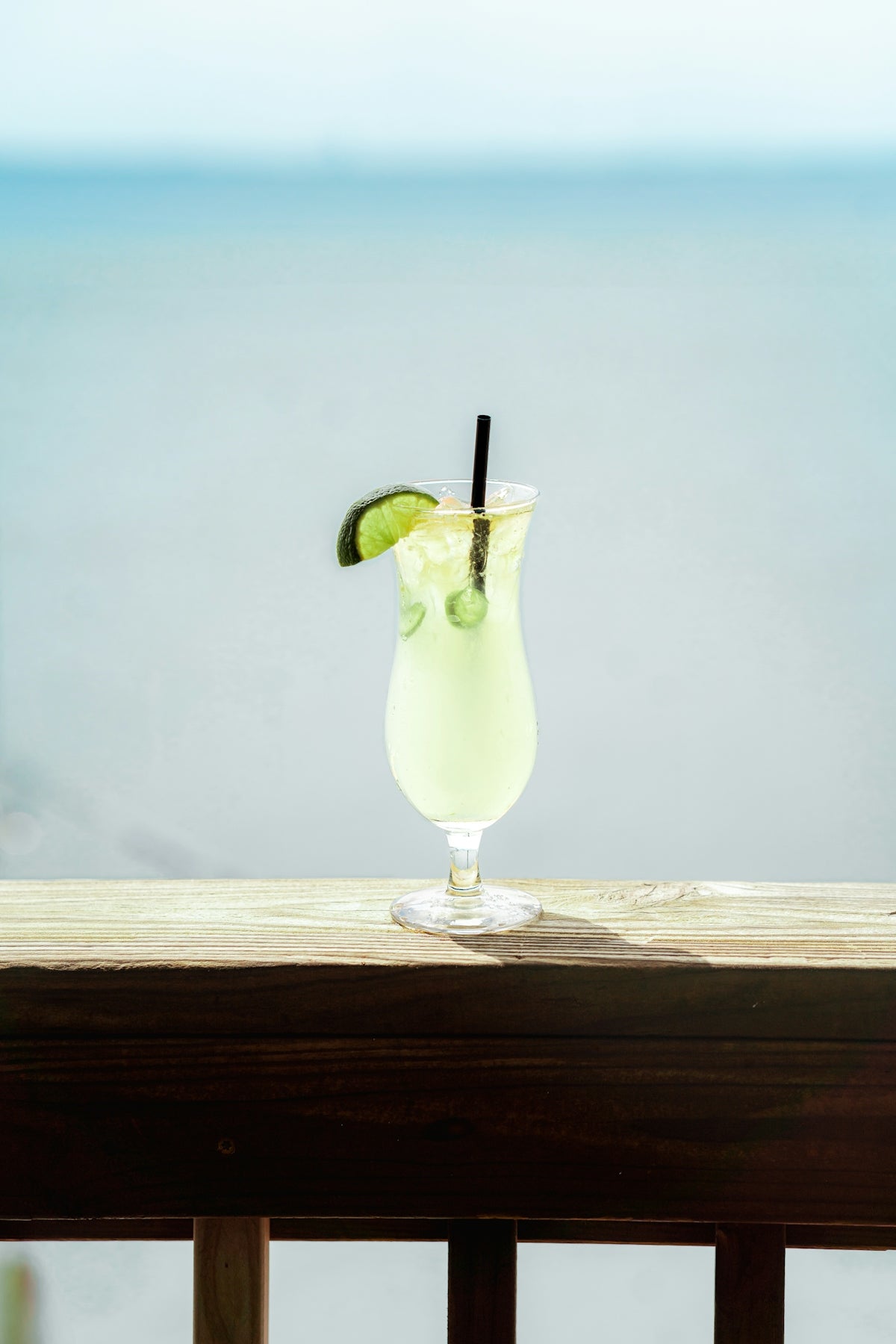 Refreshing cocktail by the ocean.